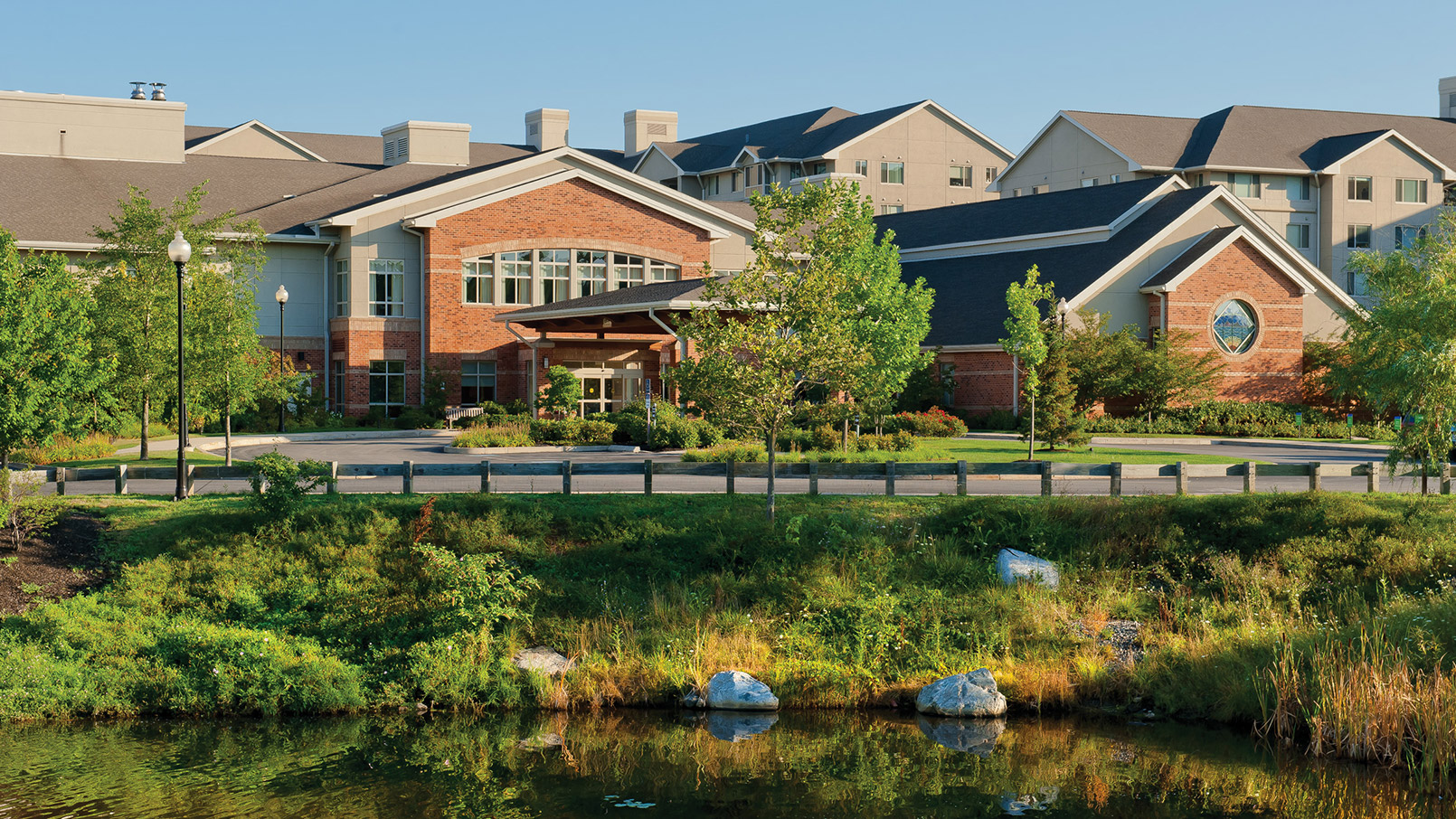 Exterior shot of a lake in the Brooksby Village community.