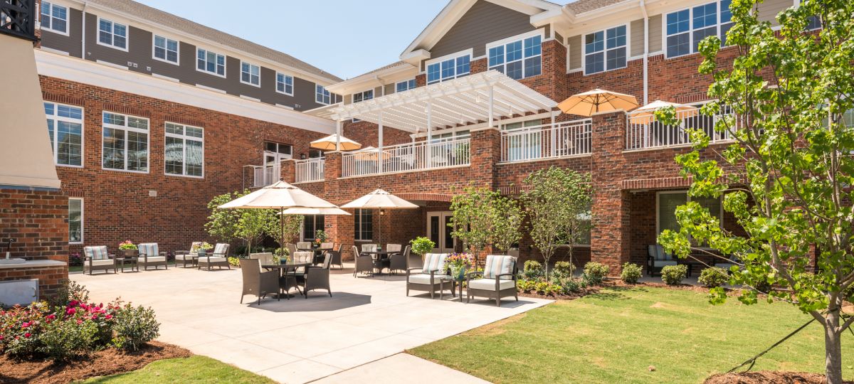 Exterior shot of courtyard in front of a Windsor Run community building.