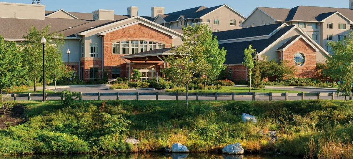 Exterior shot of a lake in the Brooksby Village community.