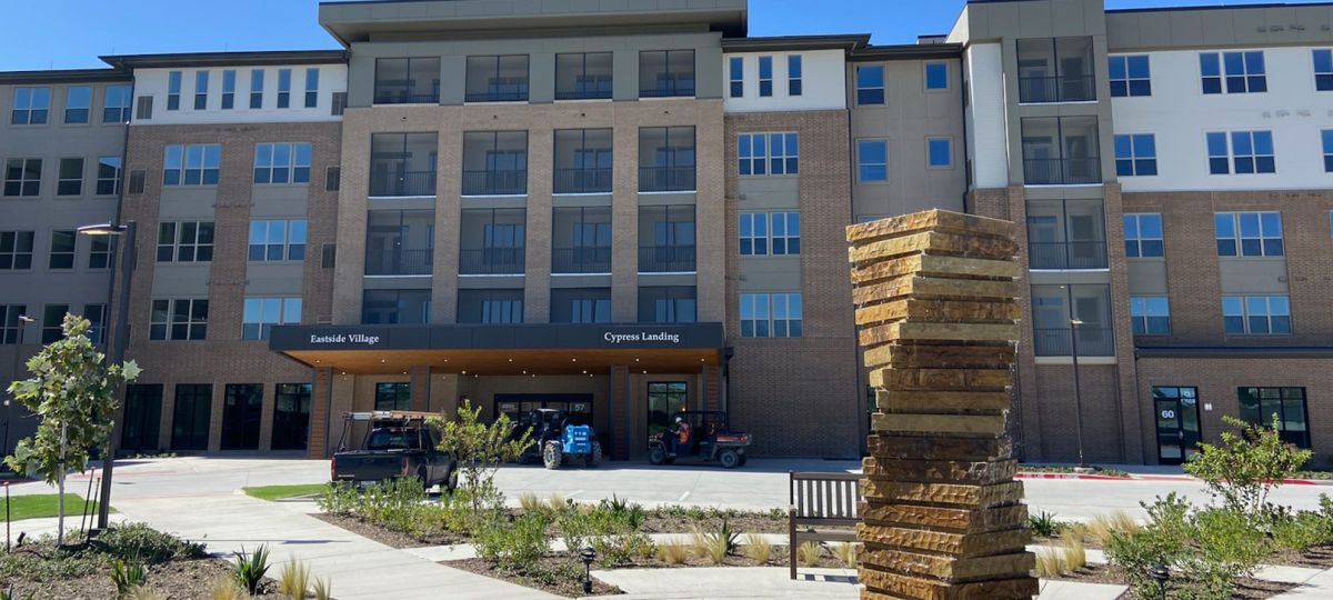 Exterior shot of a residential building at Highland Springs, an Erickson Senior Living community in Dallas, Texas.