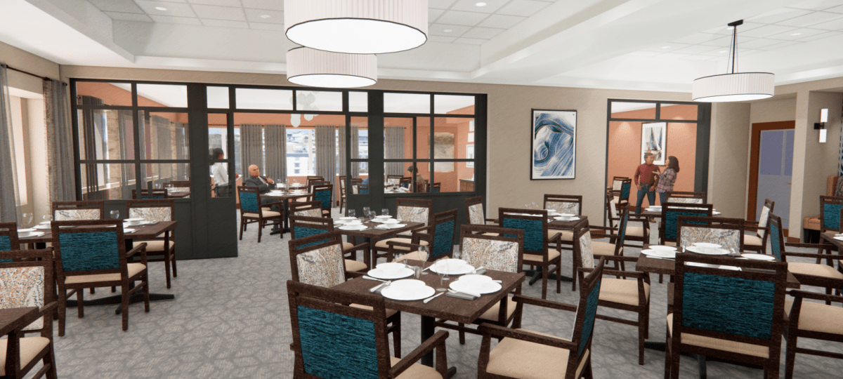 Bright private dining space with neatly set tables, large windows, and residents seated for a quiet meal.